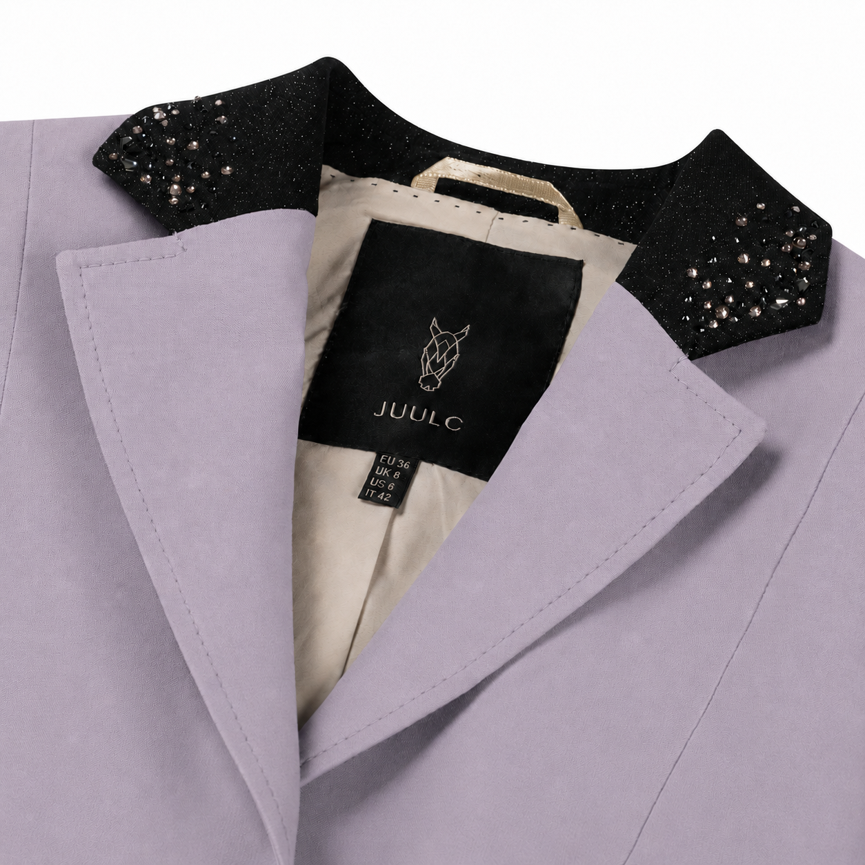 Detail of JuulC lilac competition jacket with black glitter collar and Swarovski crystals